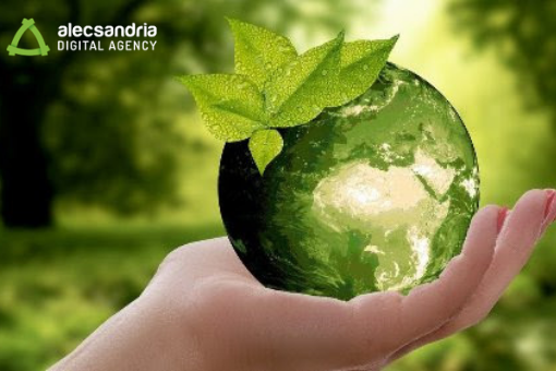 Concetto di sostenibilità ambientale espresso da una mano che sorregge un pianeta verde
